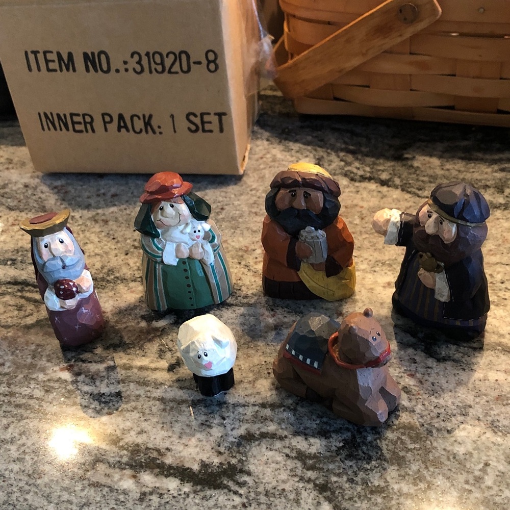 Nativity scene wise men, shepherd and animals.